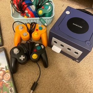 Pre-owned Purple Game Cube, games, and controllers bundle